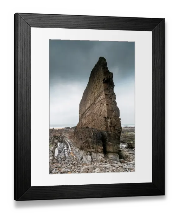 Framed Print : Sea stack of vertically bedded, Carboniferous age, Bude sandstone. This bed or horizon is more resistant to erosion than the surrounding layers and remains standing, but will eventually fall, Bude, Cornwall, UK. January, 2022 Framed Print : Sea stack of vertically bedded, Carboniferous age, Bude sandstone. This bed or horizon is more resistant to erosion than the surrounding layers and remains standing, but will eventually fall, Bude, Cornwall, UK. January, 2022