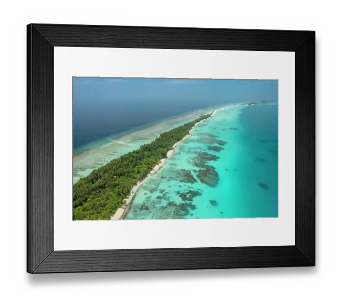 Framed Print : Aerial view of narrow coral atoll island with palm trees and white sand beach surrounded by reef, Dhigurah Island, South Ari Atoll, Maldives, Indian Ocean. February, 2020