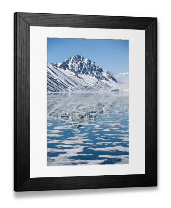 Framed Print : Snow-covered mountains reflecting on drifting and melting sea ice, Spitsbergen, Svalbard, Norway, Arctic Ocean. July, 2008 Framed Print : Snow-covered mountains reflecting on drifting and melting sea ice, Spitsbergen, Svalbard, Norway, Arctic Ocean. July, 2008