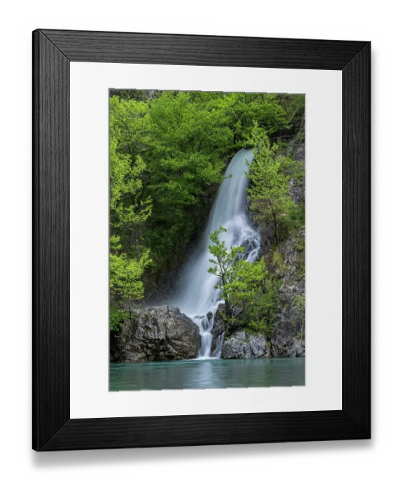 Framed Print : Waterfall flowing onto the Aoos River in Konitsa gorge, Epirus region, Greece. May, 2022 Framed Print : Waterfall flowing onto the Aoos River in Konitsa gorge, Epirus region, Greece. May, 2022
