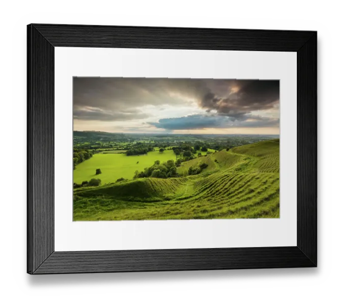 Framed Print : Prehistoric hill fort of Hambledon Hill above the Blackmore Vale, Dorset, England, UK, September 2015 Framed Print : Prehistoric hill fort of Hambledon Hill above the Blackmore Vale, Dorset, England, UK, September 2015