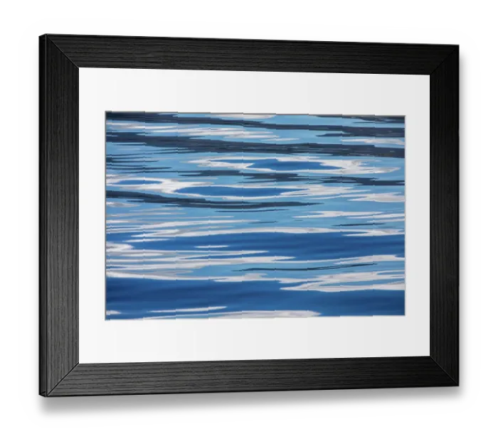 Framed Print : Calm day on the Pacific Ocean with blue sky and clouds reflected Framed Print : Calm day on the Pacific Ocean with blue sky and clouds reflected
