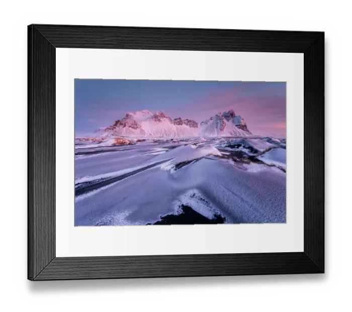 Framed Print : Vestrahorn mountain and sand dunes covered in snow at sunrise. Stokksnes Peninsula, Iceland. January, 2024 Framed Print : Vestrahorn mountain and sand dunes covered in snow at sunrise. Stokksnes Peninsula, Iceland. January, 2024