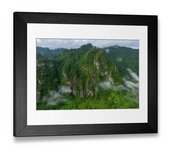 Framed Print : Aerial view of forest covered mountains and low cloud in Namosi Province on Fiji's largest island, Viti Levu, Fiji. June, 2023