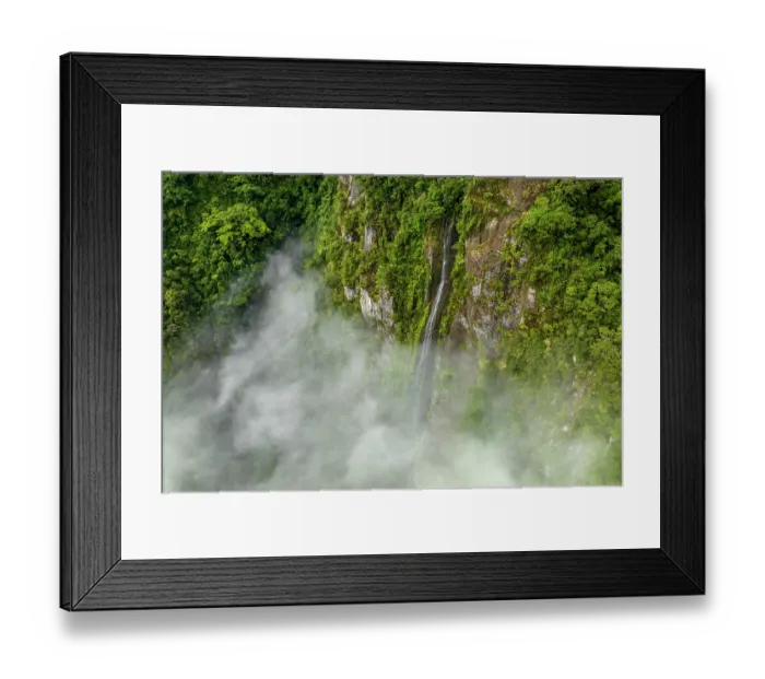 Framed Print : Aerial view of waterfall cascading down steep mountainside with low cloud, Namosi Province, Viti Levu, Fiji. June, 2023 Framed Print : Aerial view of waterfall cascading down steep mountainside with low cloud, Namosi Province, Viti Levu, Fiji. June, 2023