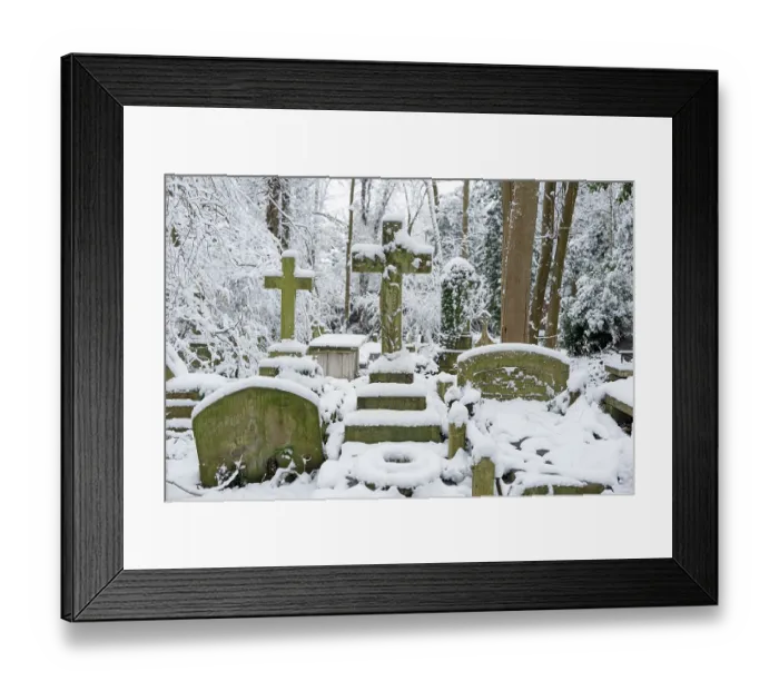 Framed Print : Gravestones covered in snow, Highgate cemetery, London, England, UK. February, 2021 Framed Print : Gravestones covered in snow, Highgate cemetery, London, England, UK. February, 2021