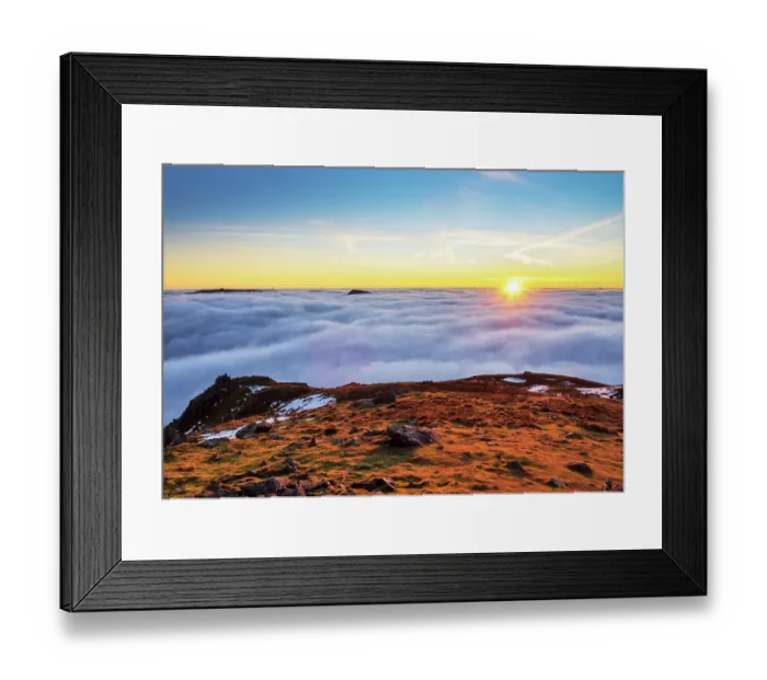 Framed Print : Summit of Ill Bell poking out of valley mist over Kentmere Fells, as seen from summit of Red Screes at dawn, Lake District, Cumbria, UK, January 2022