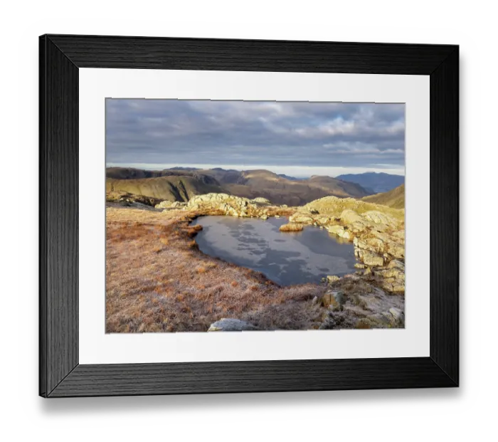 Framed Print : Frozen tarn on Glaramara mountain summit, Lake District, Cumbria, UK. December, 2022 Framed Print : Frozen tarn on Glaramara mountain summit, Lake District, Cumbria, UK. December, 2022