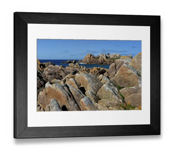 Framed Print : Granite rocks along the coast, Cotes d'Armor, Brittany, France. May, 2023 Framed Print : Granite rocks along the coast, Cotes d'Armor, Brittany, France. May, 2023