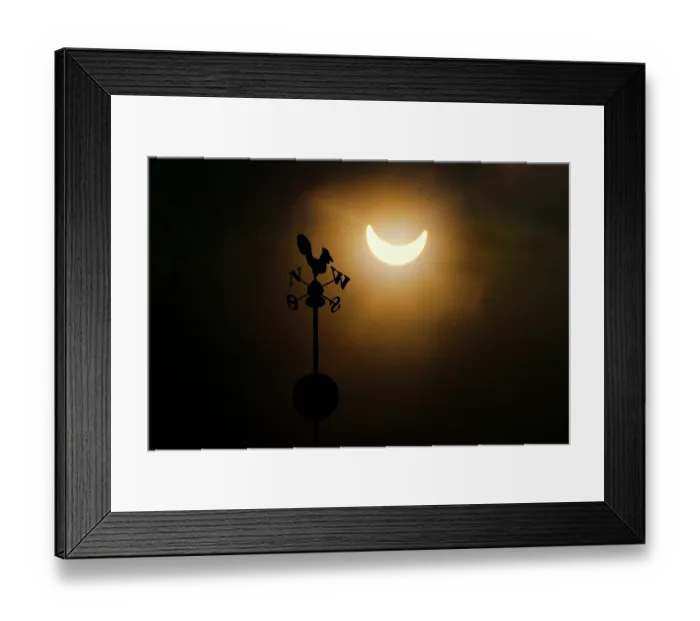 Framed Print : Partial solar eclipse above silhouette of weather vane, Wroclaw, Poland. 3rd March, 2015 Framed Print : Partial solar eclipse above silhouette of weather vane, Wroclaw, Poland. 3rd March, 2015