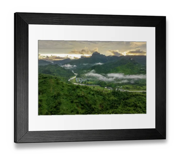 Framed Print : Aerial view of a Fijian village on the banks of a river in Namosi Province in the forested interior of Viti Levu, Fiji. June, 2023