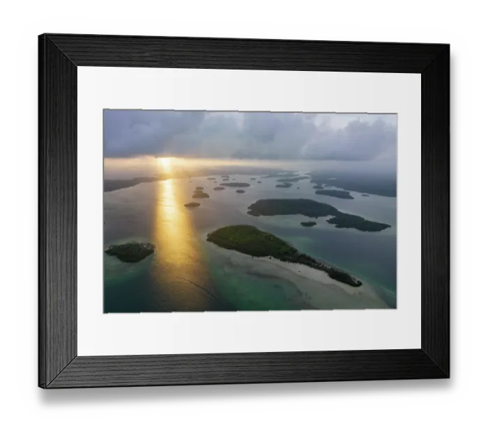 Framed Print : Aerial view of sunset over the Roviana lagoon and dozens of small, uninhabited islets, Western Province, Solomon Islands, Pacific Ocean. July, 2023 Framed Print : Aerial view of sunset over the Roviana lagoon and dozens of small, uninhabited islets, Western Province, Solomon Islands, Pacific Ocean. July, 2023