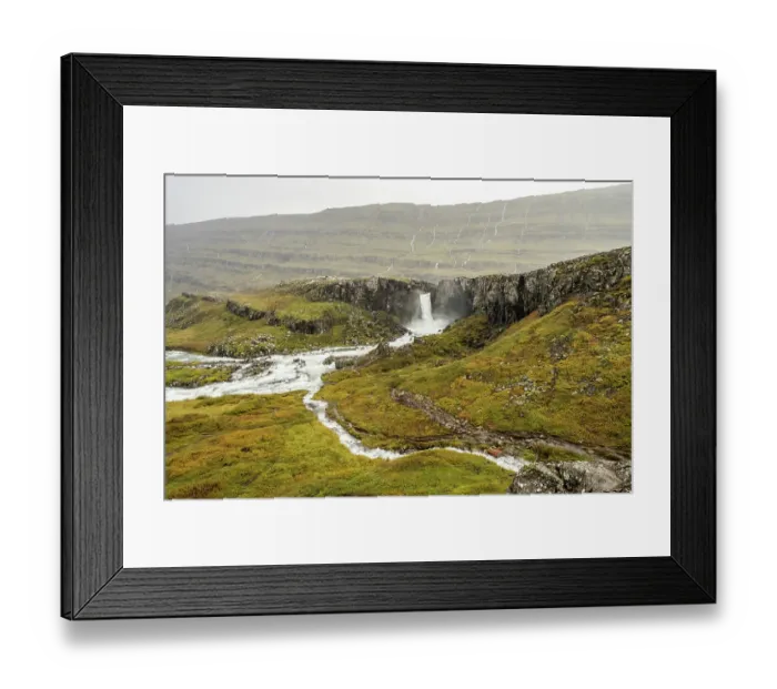 Framed Print : Foladafoss Waterfall and the Berufjaroara River during very heavy rainfall, with temporary streamlets flowing overland, east Iceland. September, 2023