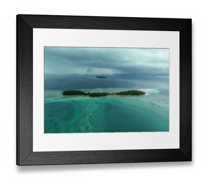 Framed Print : Aerial view of Kundukundu Nomana Island, a small uninhabited island near Munda, New Georgia, Western Province, Solomon Islands, Pacific Ocean. July, 2023 Framed Print : Aerial view of Kundukundu Nomana Island, a small uninhabited island near Munda, New Georgia, Western Province, Solomon Islands, Pacific Ocean. July, 2023