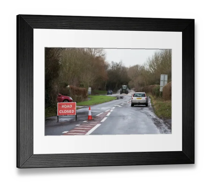 Framed Print : Closed road with an abandoned vehicle at roadside and a car and tractor driving through floodwater, Hereford Road, south of Leominster, River Arrow flood plain, Herefordshire Framed Print : Closed road with an abandoned vehicle at roadside and a car and tractor driving through floodwater, Hereford Road, south of Leominster, River Arrow flood plain, Herefordshire