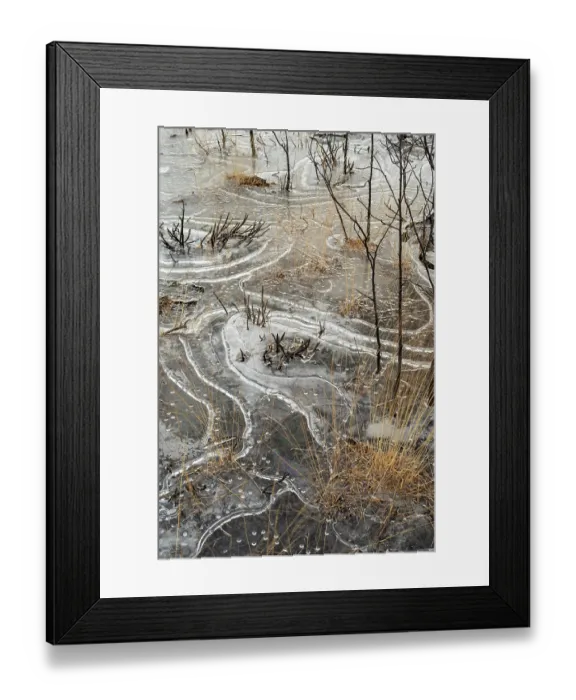 Framed Print : Unusual ice patterns caused by extremely low temperatures and wind on small heathland pond, Thursley Common National nature reserve and SSSI, Surrey Hills AONB, Thursley, Surrey