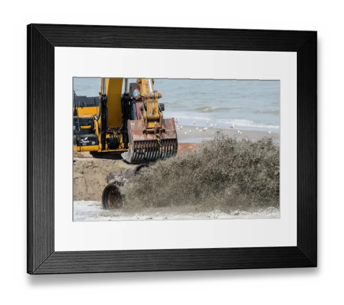 Framed Print : Crawler hydraulic excavator used for sand replenishment / beach nourishment to reduce storm damage along the Dutch coast at Zeeland, Netherlands. June, 2023 Framed Print : Crawler hydraulic excavator used for sand replenishment / beach nourishment to reduce storm damage along the Dutch coast at Zeeland, Netherlands. June, 2023