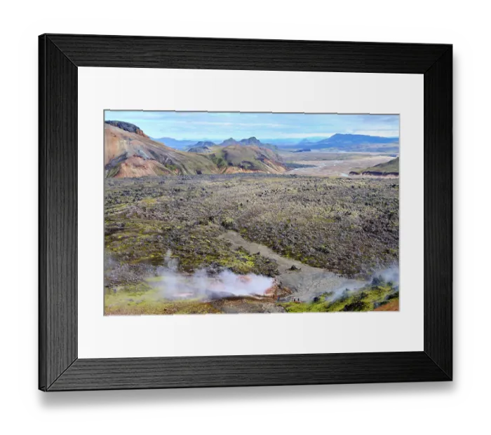 Framed Print : View of rhyolite mountains and solidified lava fields with steam from geothermal vents, Landmannalaugar volcanic massif, Fjallabak Nature Reserve, Iceland. September, 2023 Framed Print : View of rhyolite mountains and solidified lava fields with steam from geothermal vents, Landmannalaugar volcanic massif, Fjallabak Nature Reserve, Iceland. September, 2023