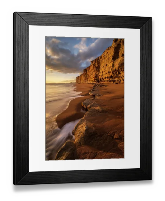 Framed Print : Late evening light bathing the sandstone cliffs at Burton Bradstock, Jurassic Coast World Heritage Site, Dorset, England, UK. February, 2023 Framed Print : Late evening light bathing the sandstone cliffs at Burton Bradstock, Jurassic Coast World Heritage Site, Dorset, England, UK. February, 2023
