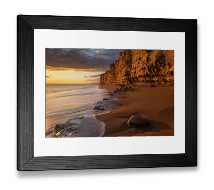 Framed Print : Sandstone cliffs at sunset, Burton Bradstock, Jurassic Coast World Heritage Site, Dorset, England, UK. February, 2023 Framed Print : Sandstone cliffs at sunset, Burton Bradstock, Jurassic Coast World Heritage Site, Dorset, England, UK. February, 2023