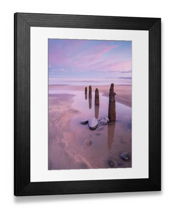 Framed Print : Westward Ho! beach at sunrise, low tide with old wooden groynes exposed, North Devon, England, UK. January, 2023 Framed Print : Westward Ho! beach at sunrise, low tide with old wooden groynes exposed, North Devon, England, UK. January, 2023
