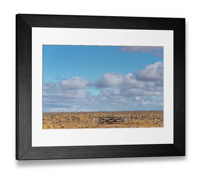 Framed Print : Farm gate with Andean mountains and associated mirages in the Patagonia desert along Ruta40, near Alto Rio Senguer, Argentina. March. 2024 Framed Print : Farm gate with Andean mountains and associated mirages in the Patagonia desert along Ruta40, near Alto Rio Senguer, Argentina. March. 2024
