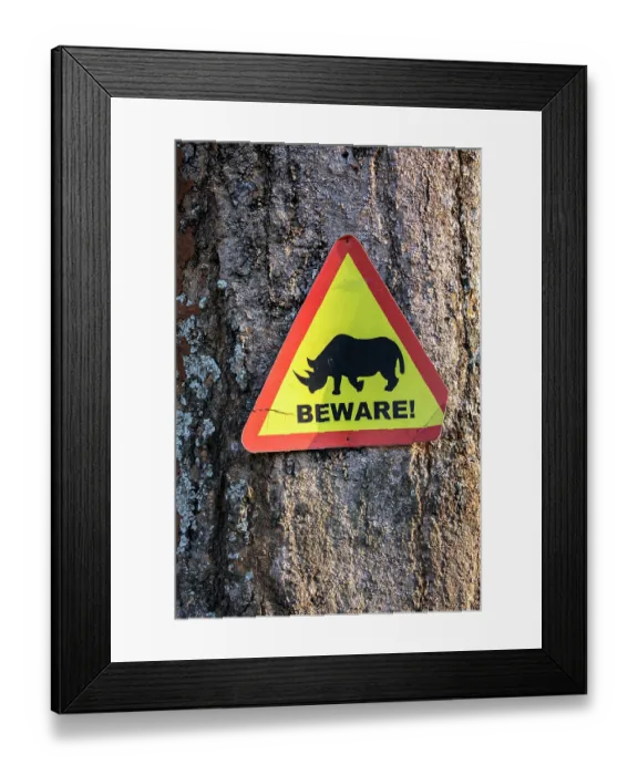 Framed Print : Southern white rhinocero (Ceratotherium simum) warning sign on tree trunk, Ziwa rhino sanctuary, Uganda Framed Print : Southern white rhinocero (Ceratotherium simum) warning sign on tree trunk, Ziwa rhino sanctuary, Uganda