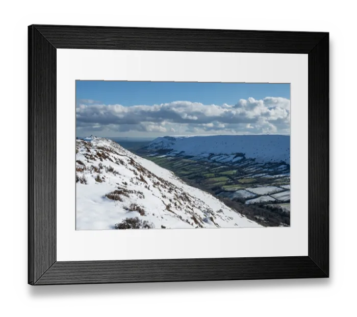 Framed Print : The Olchon Valley with small fields with rows of trees in hedges and the escarpment of the Black Mountains from Black Hill / Cat's Back, Herefordshire, England, UK. March, 2024 Framed Print : The Olchon Valley with small fields with rows of trees in hedges and the escarpment of the Black Mountains from Black Hill / Cat's Back, Herefordshire, England, UK. March, 2024