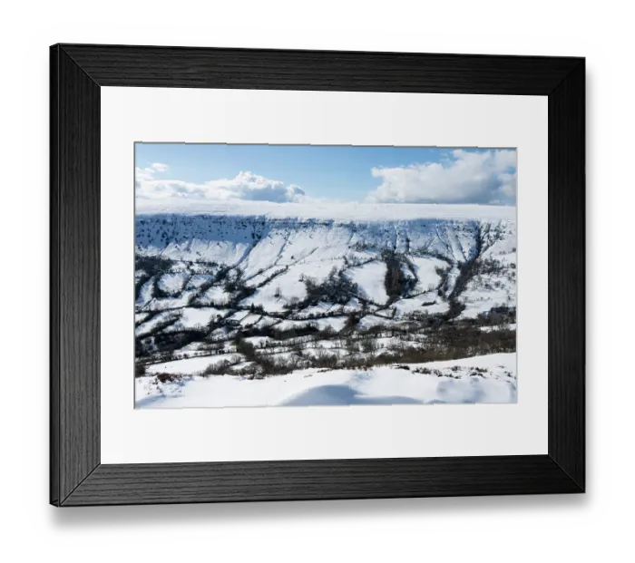 Framed Print : The Olchon Valley with small fields with rows of trees in hedges and the escarpment of the Black Mountains from Black Hill, Herefordshire, England, UK. March, 2024 Framed Print : The Olchon Valley with small fields with rows of trees in hedges and the escarpment of the Black Mountains from Black Hill, Herefordshire, England, UK. March, 2024