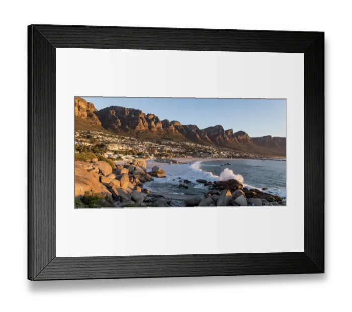 Framed Print : View along Camps Bay beach with the 12 Apostle mountains in the background, outside Cape Town, Western Cape, South Africa. February, 2024 Framed Print : View along Camps Bay beach with the 12 Apostle mountains in the background, outside Cape Town, Western Cape, South Africa. February, 2024