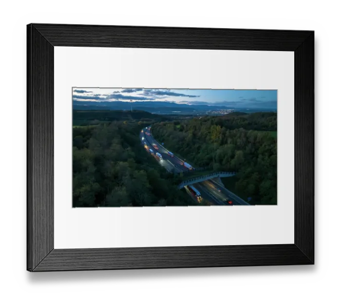 Framed Print : Aerial view of a wildlife crossing over the A7 highway at dusk, built in 2011, city of Salaise-sur-Sanne in the distance, Drome, France. November, 2023 Framed Print : Aerial view of a wildlife crossing over the A7 highway at dusk, built in 2011, city of Salaise-sur-Sanne in the distance, Drome, France. November, 2023