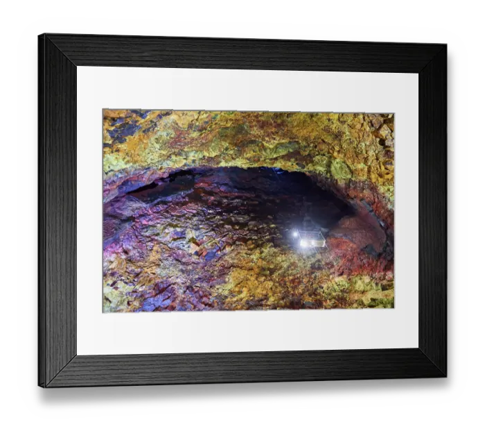 Framed Print : Colourful rocks inside the magma chamber of Thrihnukagigur volcano with torch light from an open cable lift Framed Print : Colourful rocks inside the magma chamber of Thrihnukagigur volcano with torch light from an open cable lift