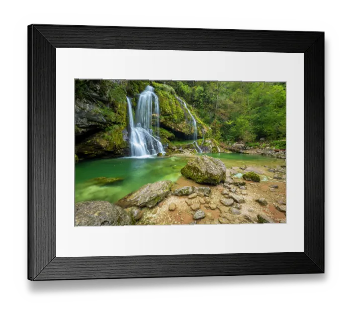 Framed Print : Virje Waterfall fed by the Glijun stream which comes from the waters of the Kanin massif. A rare karst spring that never dries up. Bovec, Julian Alps. Slovenia. August, 2023 Framed Print : Virje Waterfall fed by the Glijun stream which comes from the waters of the Kanin massif. A rare karst spring that never dries up. Bovec, Julian Alps. Slovenia. August, 2023