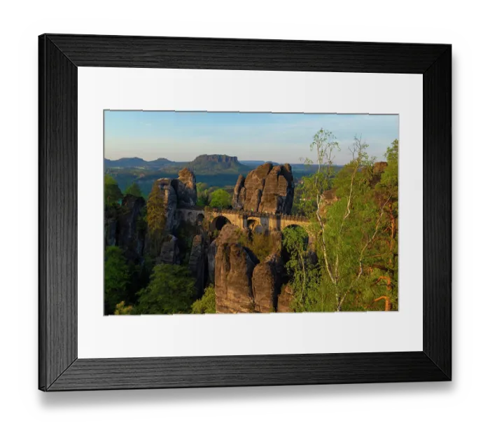 Framed Print : Bastei Bridge surrounded by towering sandstone rock formations and Silver birch (Betula pendula) trees with table mountains in background, Saxon Switzerland National Park, Saxony Framed Print : Bastei Bridge surrounded by towering sandstone rock formations and Silver birch (Betula pendula) trees with table mountains in background, Saxon Switzerland National Park, Saxony