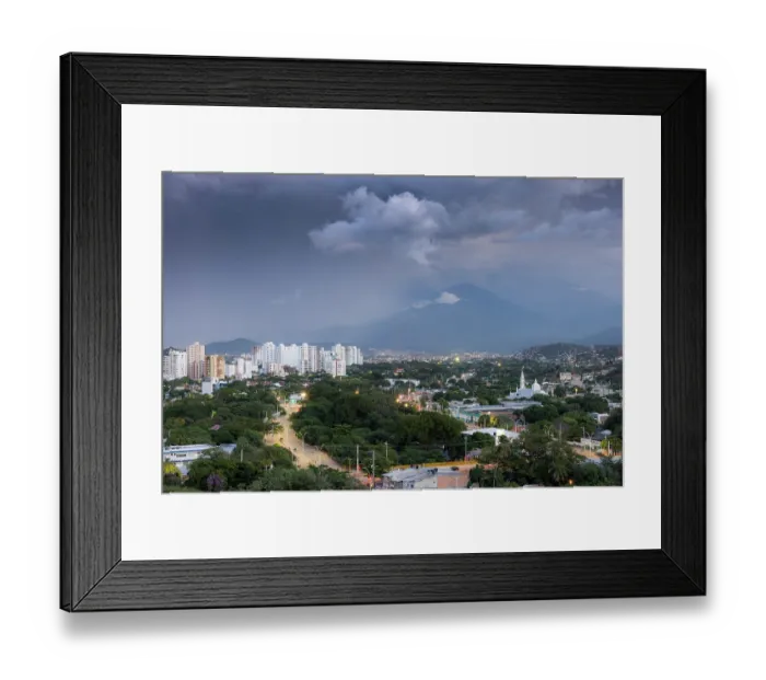 Framed Print : The city of Santa Marta below the slopes of the Sierra Nevada de Santa Marta under a dark sky, Colombia. November, 2021 Framed Print : The city of Santa Marta below the slopes of the Sierra Nevada de Santa Marta under a dark sky, Colombia. November, 2021
