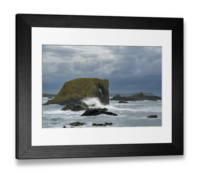 Framed Print : Waves crashing against Elephant Rock, Ballintoy Area, County Antrim, Northern Ireland, UK. June, 2022 Framed Print : Waves crashing against Elephant Rock, Ballintoy Area, County Antrim, Northern Ireland, UK. June, 2022