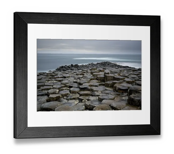 Framed Print : Basalt hexagonal rocks at the Giant's Causeway, UNESCO World Heritage Site, County Antrim, Northern Ireland, UK. June, 2022 Framed Print : Basalt hexagonal rocks at the Giant's Causeway, UNESCO World Heritage Site, County Antrim, Northern Ireland, UK. June, 2022