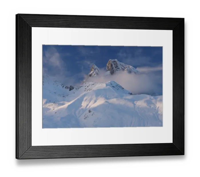 Framed Print : Clouds surrounding snow-covered Midi d'Ossau peak in the evening, Pyrenees National Park, France. February, 2024 Framed Print : Clouds surrounding snow-covered Midi d'Ossau peak in the evening, Pyrenees National Park, France. February, 2024