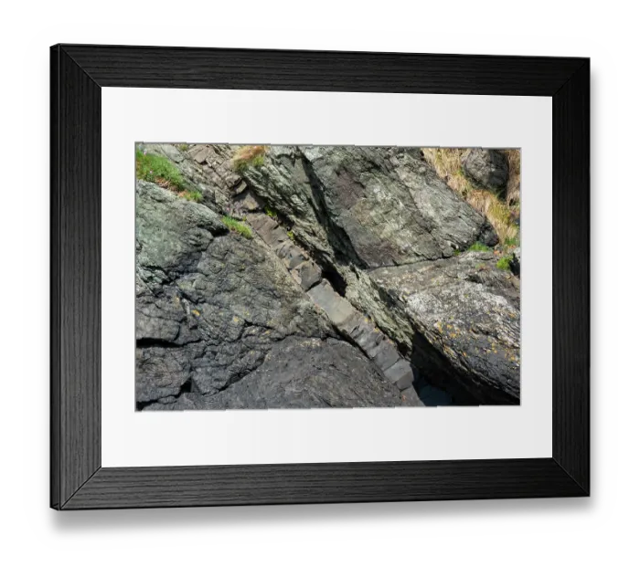 Framed Print : Paleocene age dolerite dyke within Pre-Cambrian schist. Beaumaris, Anglesey, Wales, UK. May, 2024 Framed Print : Paleocene age dolerite dyke within Pre-Cambrian schist. Beaumaris, Anglesey, Wales, UK. May, 2024
