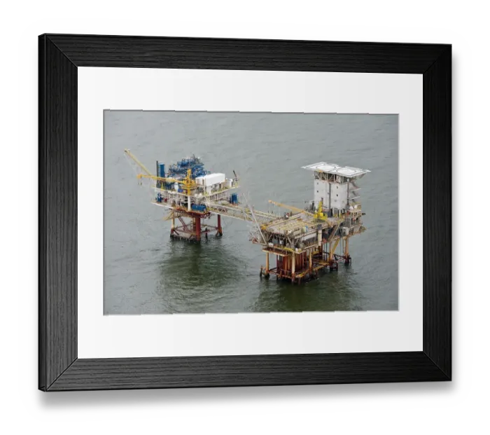 Framed Print : Aerial view of oil rig drilling platform, Louisiana, Gulf of Mexico, USA. August, 2010 Framed Print : Aerial view of oil rig drilling platform, Louisiana, Gulf of Mexico, USA. August, 2010
