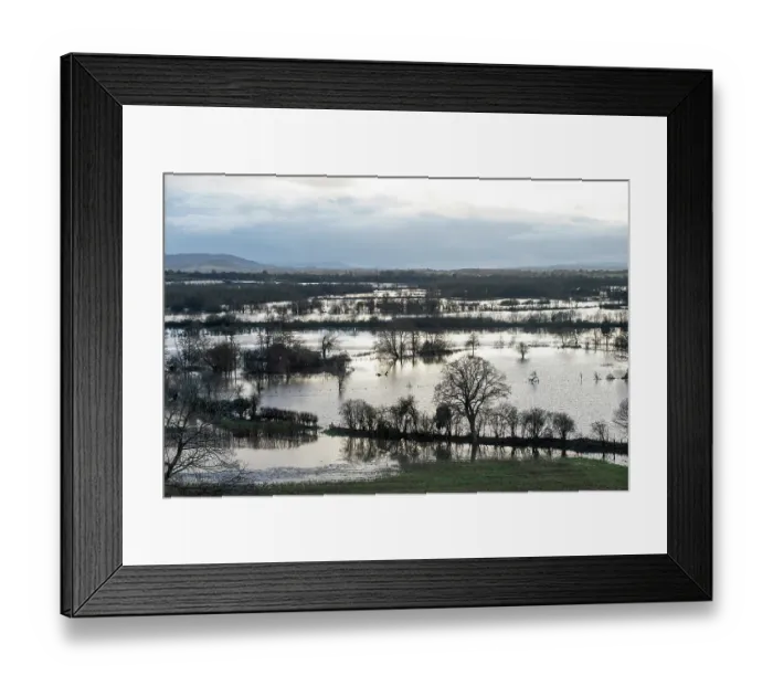 Framed Print : River Lugg floodwater covering the landscape with train on an embankment over the flood plain, south of Leominster, Herefordshire, England, UK. 3rd January, 2023 Framed Print : River Lugg floodwater covering the landscape with train on an embankment over the flood plain, south of Leominster, Herefordshire, England, UK. 3rd January, 2023