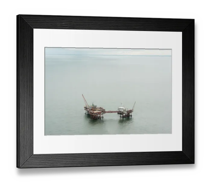 Framed Print : Aerial view of oil rig drilling platform, Louisiana, Gulf of Mexico, USA. August, 2010 Framed Print : Aerial view of oil rig drilling platform, Louisiana, Gulf of Mexico, USA. August, 2010