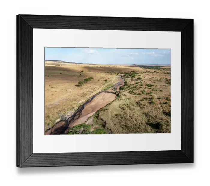Framed Print : Aerial view of river flowing through the plains, Masai-Mara game reserve, Kenya. August, 2023 Framed Print : Aerial view of river flowing through the plains, Masai-Mara game reserve, Kenya. August, 2023