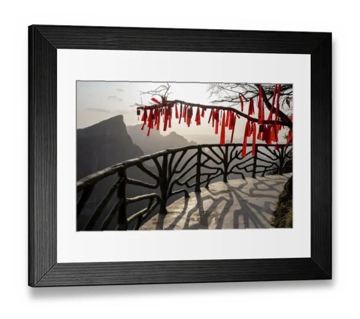 Framed Print : Buddhist prayer flags tied to tree branches, to bring good luck, Tianmen Mountain National Park, Zhangjiajie, Hunan, China. March, 2024 Framed Print : Buddhist prayer flags tied to tree branches, to bring good luck, Tianmen Mountain National Park, Zhangjiajie, Hunan, China. March, 2024