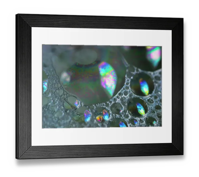 Framed Print : Patterns on soap bubble showing light interference patterns Framed Print : Patterns on soap bubble showing light interference patterns