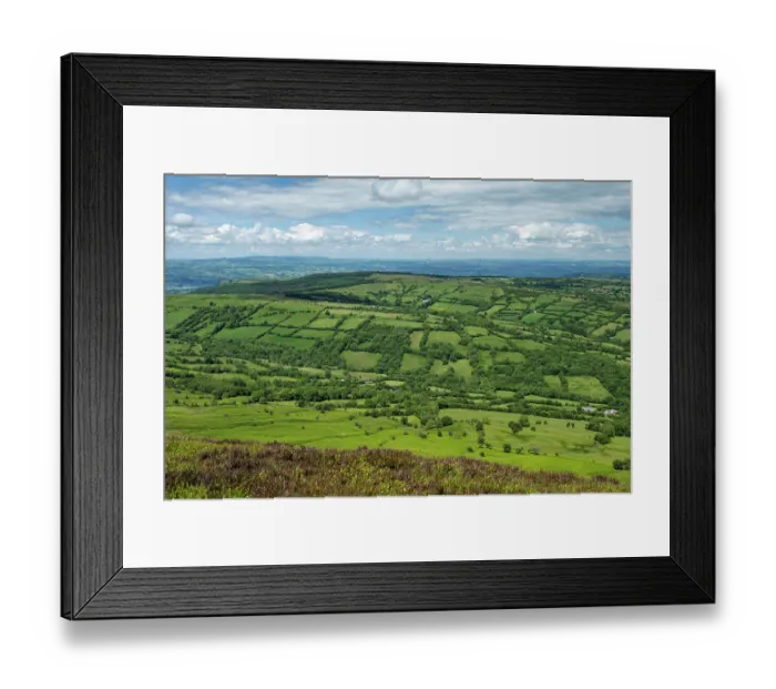 Framed Print : Cefn Hill with small Celtic type fields with tree-lined hedges viewed from Black Hill / Cat's Back, Herefordshire, England, UK. June, 2024 Framed Print : Cefn Hill with small Celtic type fields with tree-lined hedges viewed from Black Hill / Cat's Back, Herefordshire, England, UK. June, 2024