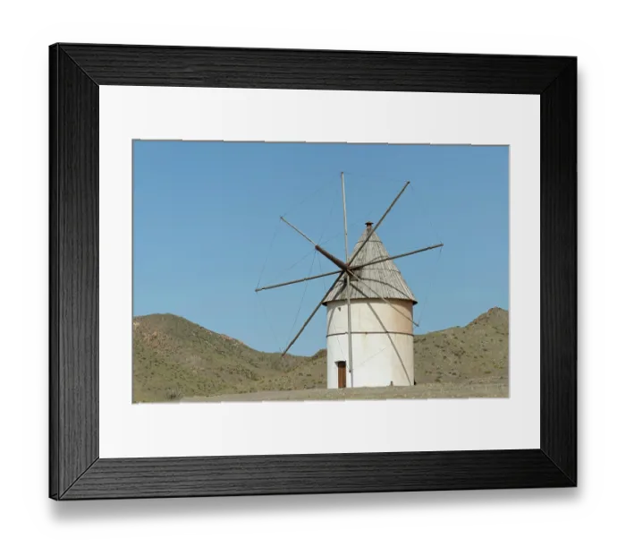 Framed Print : Traditional windmill, restored in 2009, Pozo de Los Frailes, Cabo de Gata-Nijar Natural Park, Almeria, Spain. March, 2024