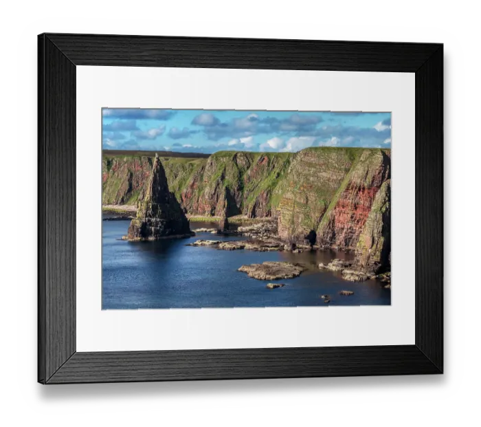 Framed Print : Sheer cliffs and sea stacks at Duncansby Head, Caithness, northern Scotland, UK. July, 2017 Framed Print : Sheer cliffs and sea stacks at Duncansby Head, Caithness, northern Scotland, UK. July, 2017