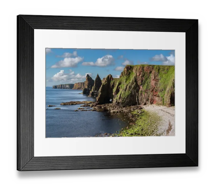 Framed Print : Sheer cliffs and sea stacks at Duncansby Head, Caithness, northern Scotland, UK. July, 2017 Framed Print : Sheer cliffs and sea stacks at Duncansby Head, Caithness, northern Scotland, UK. July, 2017