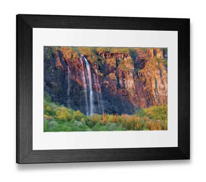 Framed Print : Waterfall cascading over cliffs during midnight sun, Nordland, Norway. June, 2022 Framed Print : Waterfall cascading over cliffs during midnight sun, Nordland, Norway. June, 2022